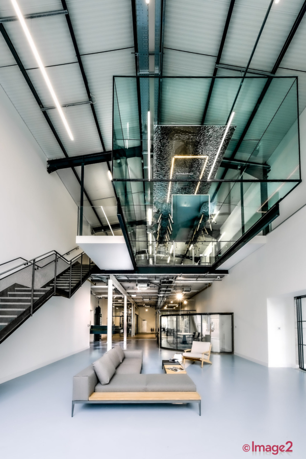 Largest Uk glazing showroom featuring floating glass box Hertfordshire Architectural photographerher