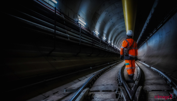 Dramatic image of construction worker in tunnel Construction Photographer London