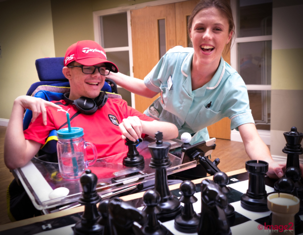 Editorial photography Happy care home patient with healthcare nurse