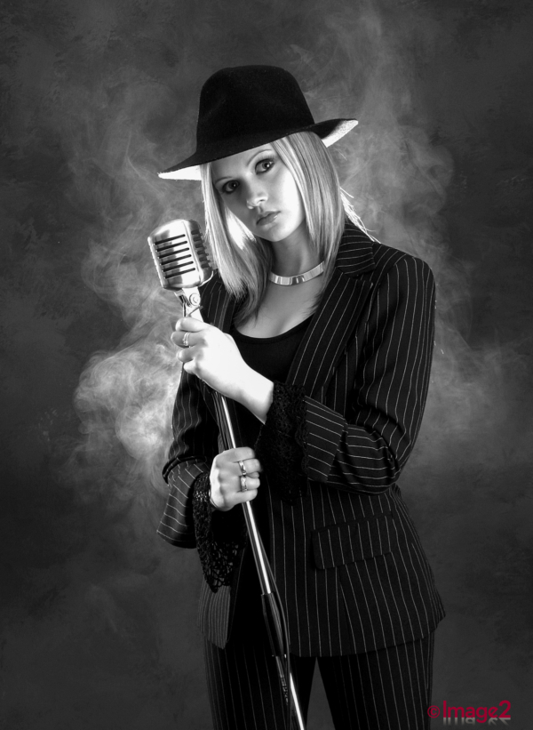 Dramatic lighting for singer in Studio with fog behind