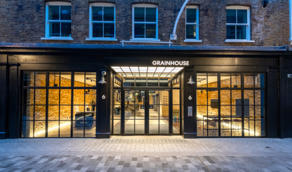 Glass front of the Grain Store office in Covent Garden Industrial looking office.