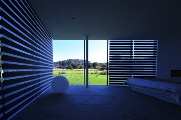 Floor to ceiling glazing allows all views allowing floods of natural light into rooms