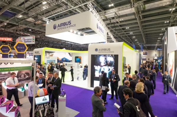 large exhibition at Excel center ,high viewpoint showing exhibitor and people talking