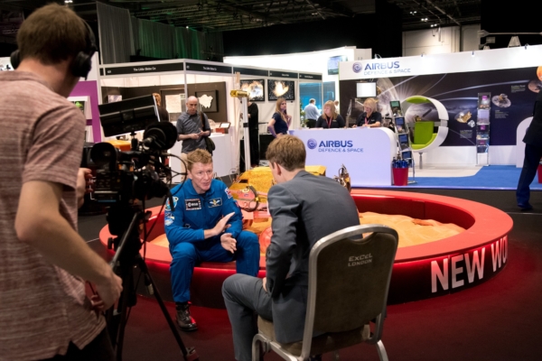 Event PhotographyTim Peake being filmed talking to journalist at Airbus stand at Excel