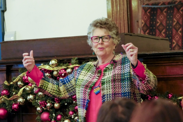 Photography of Pru Leith talking at a conference