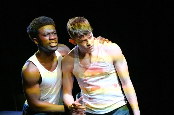 Striking emotional stage drama with powerful lighting